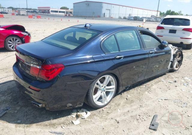 BMW F01 750i 2013 Черный 416 4400 см3